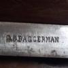 Merkteken Krulschaatsen schaatsenmaker G.C. Baggerman, Est
