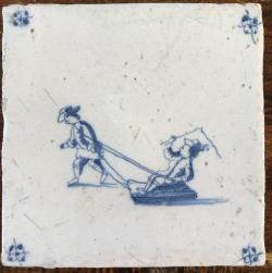 Twee schaatsers met slee en zweep