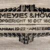 Tekst op binnenkant doos met messen, firma Meyjes & Höweler, Amsterdam