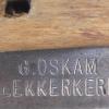 Merkteken schaatsenmaker G. Oskam, Lekkerkerk